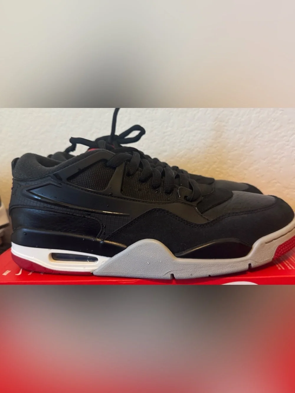 Jordan 4 RM Bred Men’s Black and Red Low-Top Sneakers